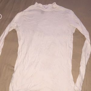 White long sleeve turtle neck shirt